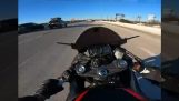 Lucky rider saves his motorcycle at 220 km/h