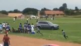 Fan trying to hit the referee with his car