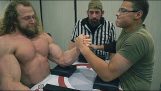 Bodybuilder versus schoolboy arm wrestling