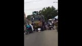 Men fall from the roof of a truck (India)