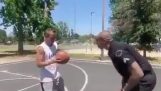 Black policeman abuses a white man in a basketball court