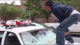Destroying a police car in New York