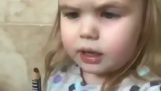 A little girl wants to try on her mom’s eyeliner
