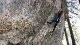 A climber is saved by her safety rope, a few centimeters from the ground
