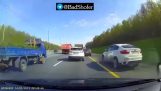 Idiot in BMW pulls a jammed gun (Russia)