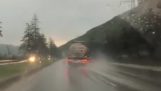Tank truck slips on wet road