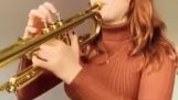 Playing trumpet with her mouth