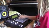 A 10 years old girl music creates an MPC