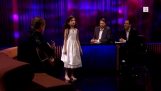 8-year old with a great voice sings “Fly me to the moon”