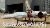 NOT A WORD. Abrams shows off an X-Wing fighter in new 'Star Wars: Episode VII’ set video