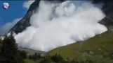 Enorma lavin dalen Grindelwald i Schweiz