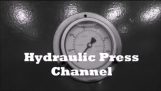 Crushing alarm clock with hydraulic press