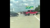 Red Truck Swerves Uncontrollably Causing Accident