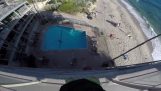 Jumping in the pool from the roof of a hotel