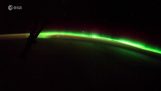 Aurora Borealis och soluppgången från den internationella rymdstationen