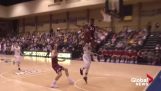 Basketball player hits with his head on the backboard
