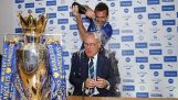 Leicester players bathe the Ranieri with champagne