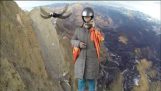 An old lady springs from a cliff to make a wingsuit flight!