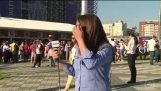 Fan tries to kiss a Brazilian journalist