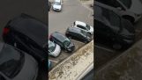Driver makes great effort to get out of a parking lot