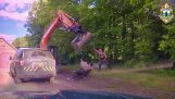 Man threatens police with an excavator