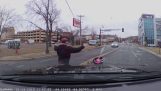 Small child in a child seat falls from car