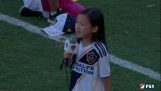 A little girl of 7 years beautifully sings the American national anthem
