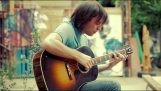 Den “Slå det” akustisk gitarr av Miguel Rivera