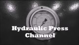 Krossning mynt med hydraulisk press