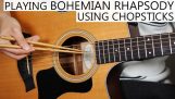 Възпроизвеждане на “Бохемска рапсодия” китара с пръчици за хранене (дълго монтаж)