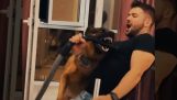 A dog saves his master from a vacuum cleaner