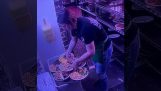 Waitress prepares a tray with 6 dishes