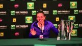 Tennis champion is asked to try and lift the trophy she just won